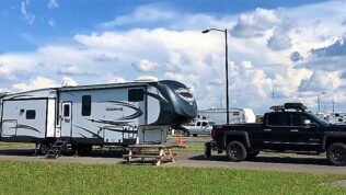 Towable camper parked at RJourney