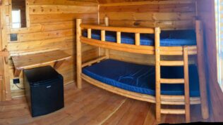 Bunk beds inside a cabin at Laramie RV Resort