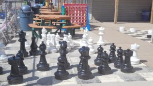 Giant chess, connect four, and picnic tables at Baraboo RV Resort