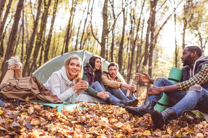 A group of friends goes camping during the Fall.