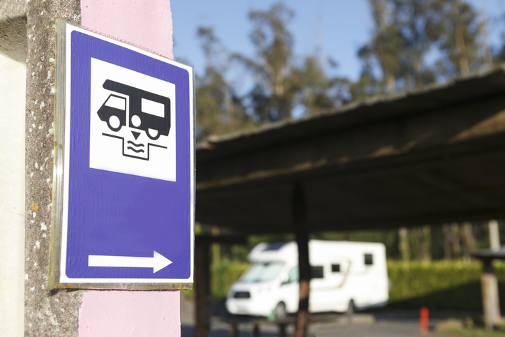 A purple sign indicates an RV dump station is to the right.