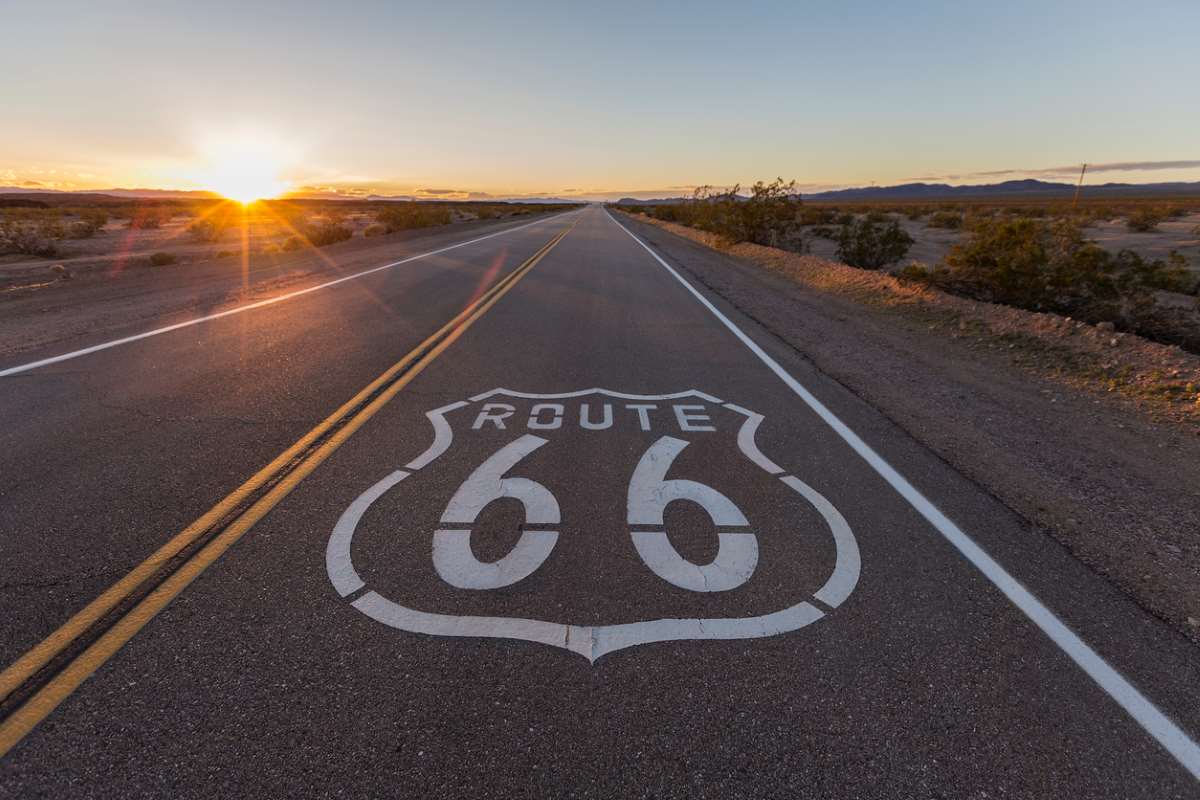 View of a sunset reflecting on the road of Route 66.