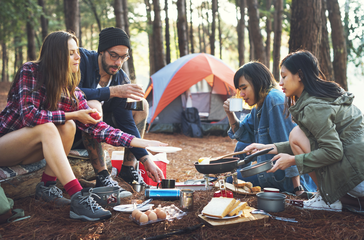 Friends camping in the forest.