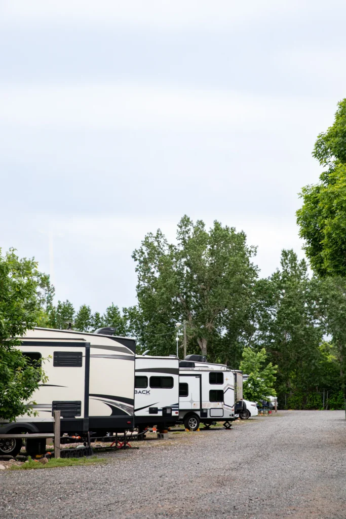 A row of Fifth-Wheel RVs at Applewood RV Resort