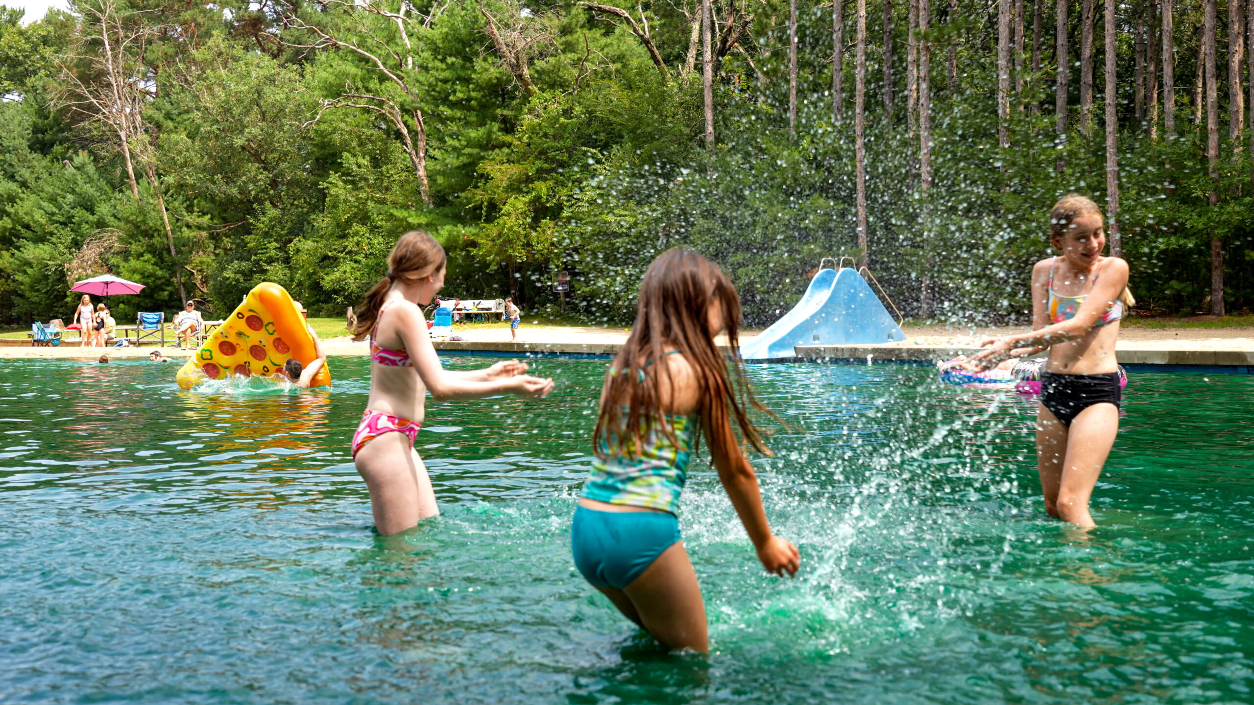 Kids splash and play at the Pearl Lake RV Campground Swimming Basin