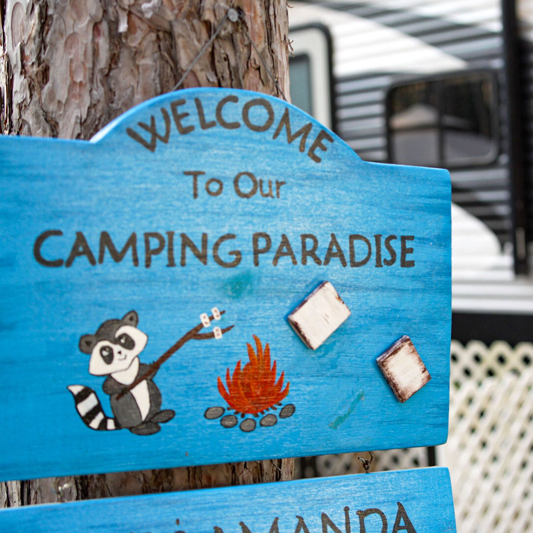 A Sign Welcomes You to "Camping Paradise"