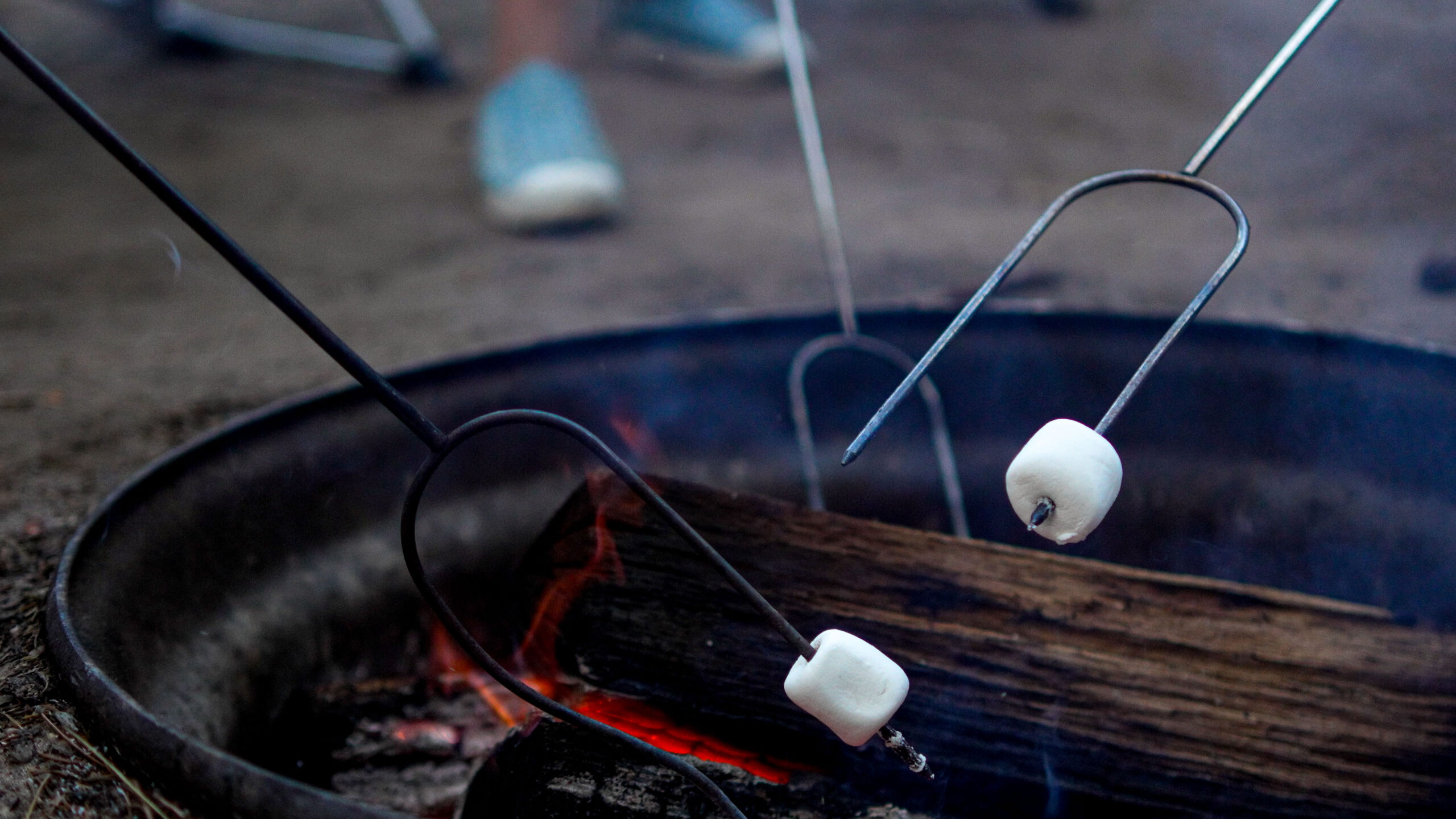 Seasonal campers roast marshmallows at Pearl Lake RV Resort