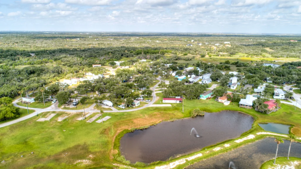 An Aerial view of Rockport RV Park by RJourney with Rockport, TX in the distance