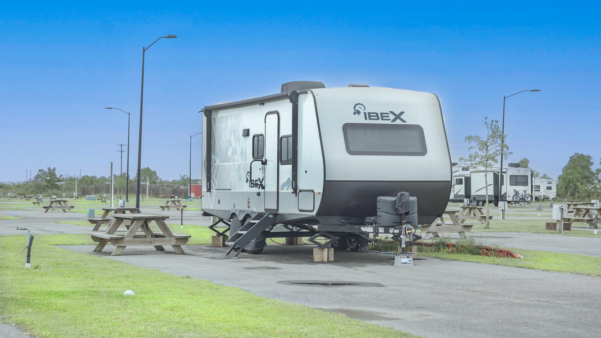 A Fifth Wheel RV Rests at Lake Charles RV Park