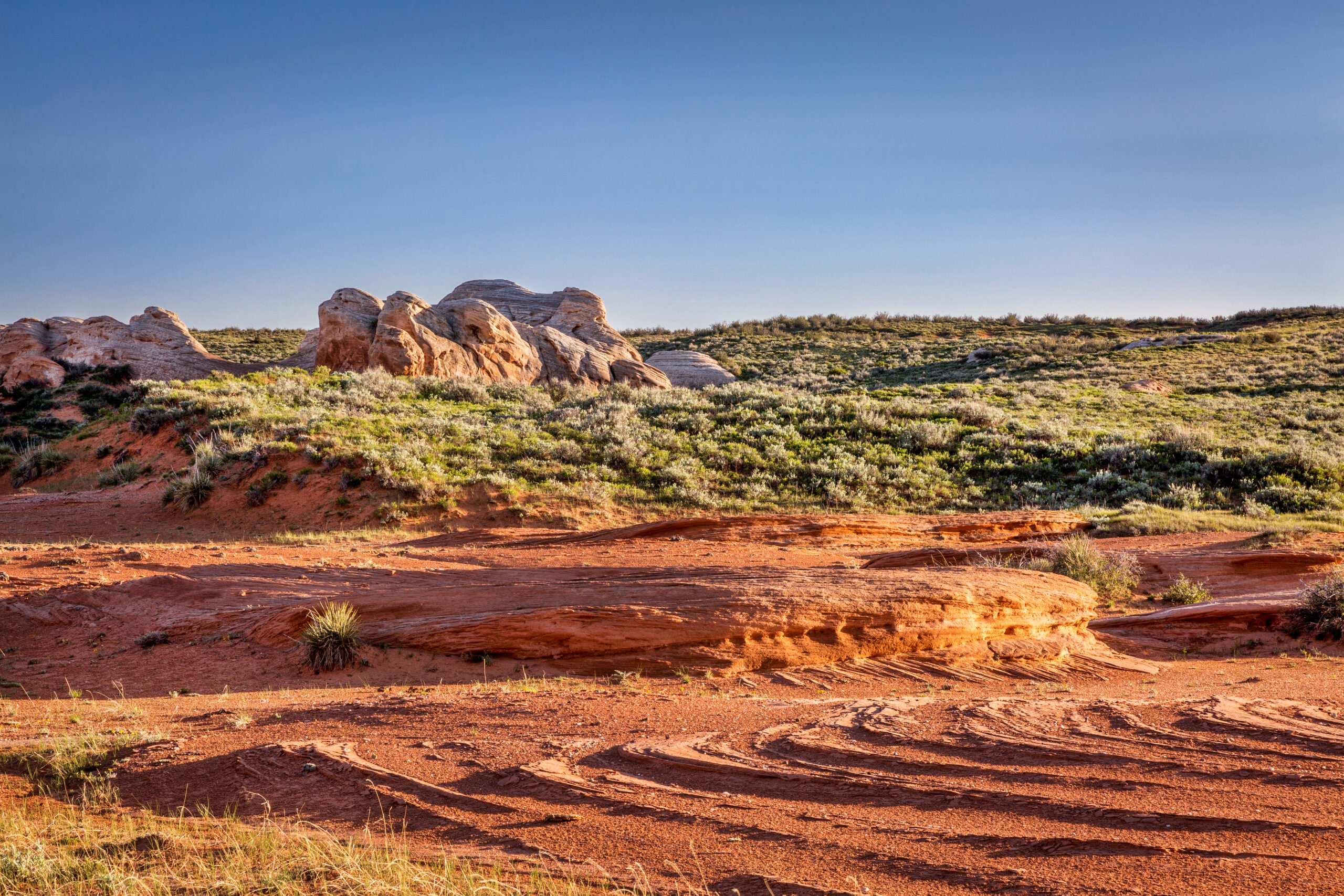 red sandstone formation and prairie in Sand Creek National Landmark at Colorado and Wyoming border near Laramie