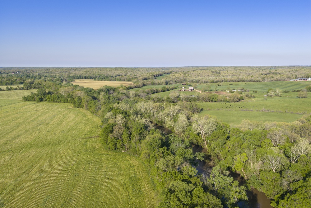 Rural landscape of Missouri Ozarks along the Bourbeuse River near Rosebud - springtime aerial view