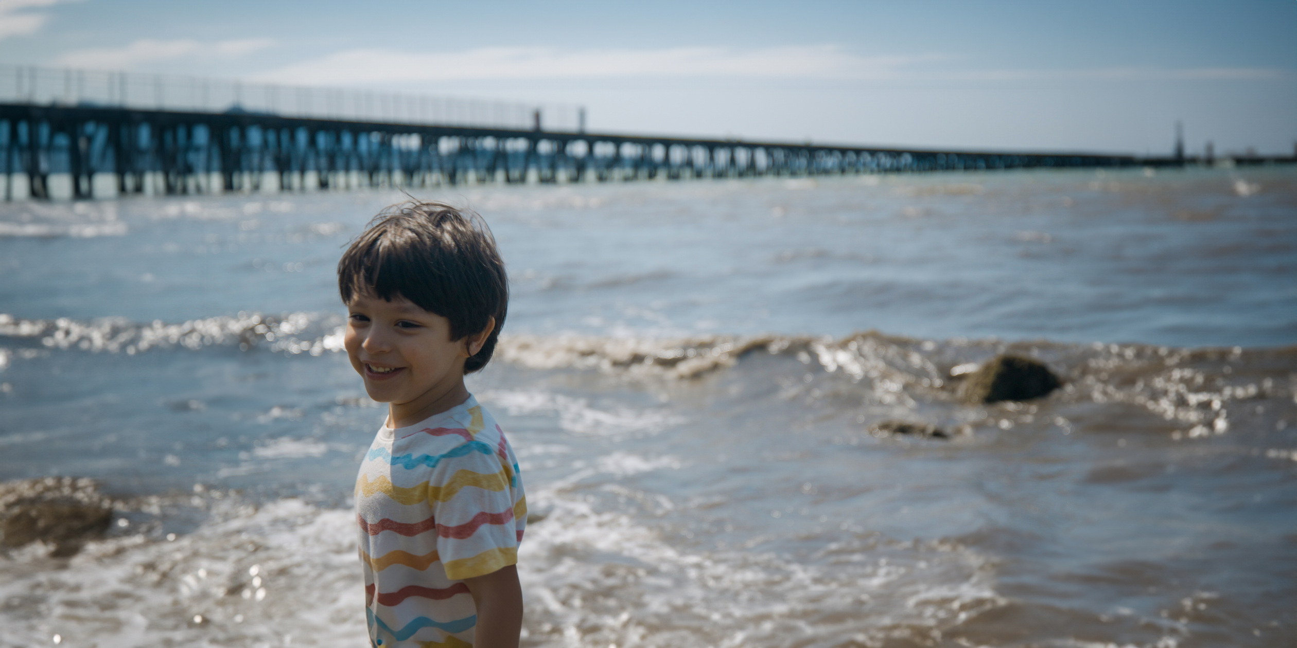Sunny Smiles - Childs Happy Day at the Beach with Pier and Waves near Grayland WA
