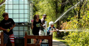 Kids throw water balloons and spray water at Baraboo RV park