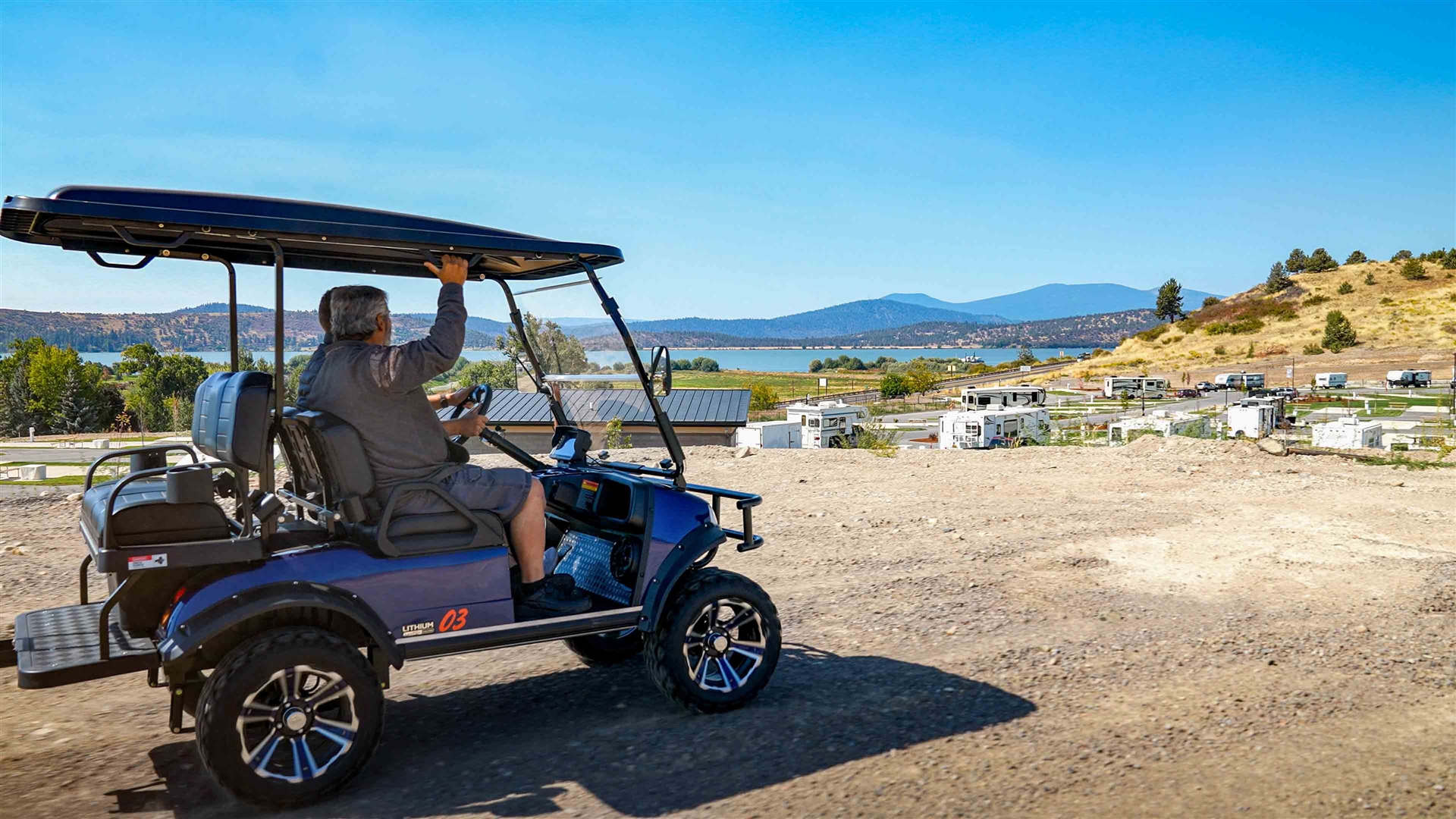 Full-hookup RV sites with concrete pads and Upper Klamath Lake views at Klamath Falls RV Resort, Oregon