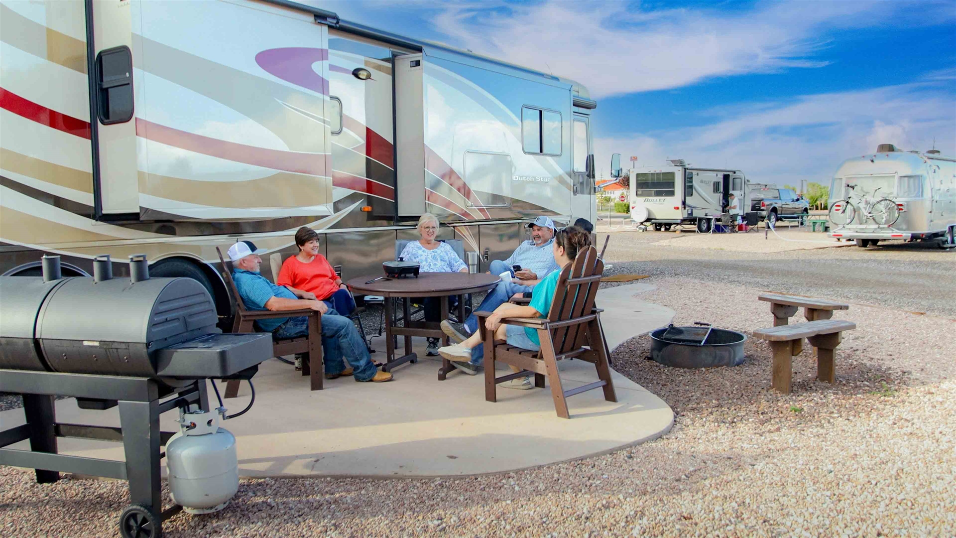 Full hookup RV sites with concrete pads at Laramie RV Resort by RJourney near the Laramie River in Wyoming