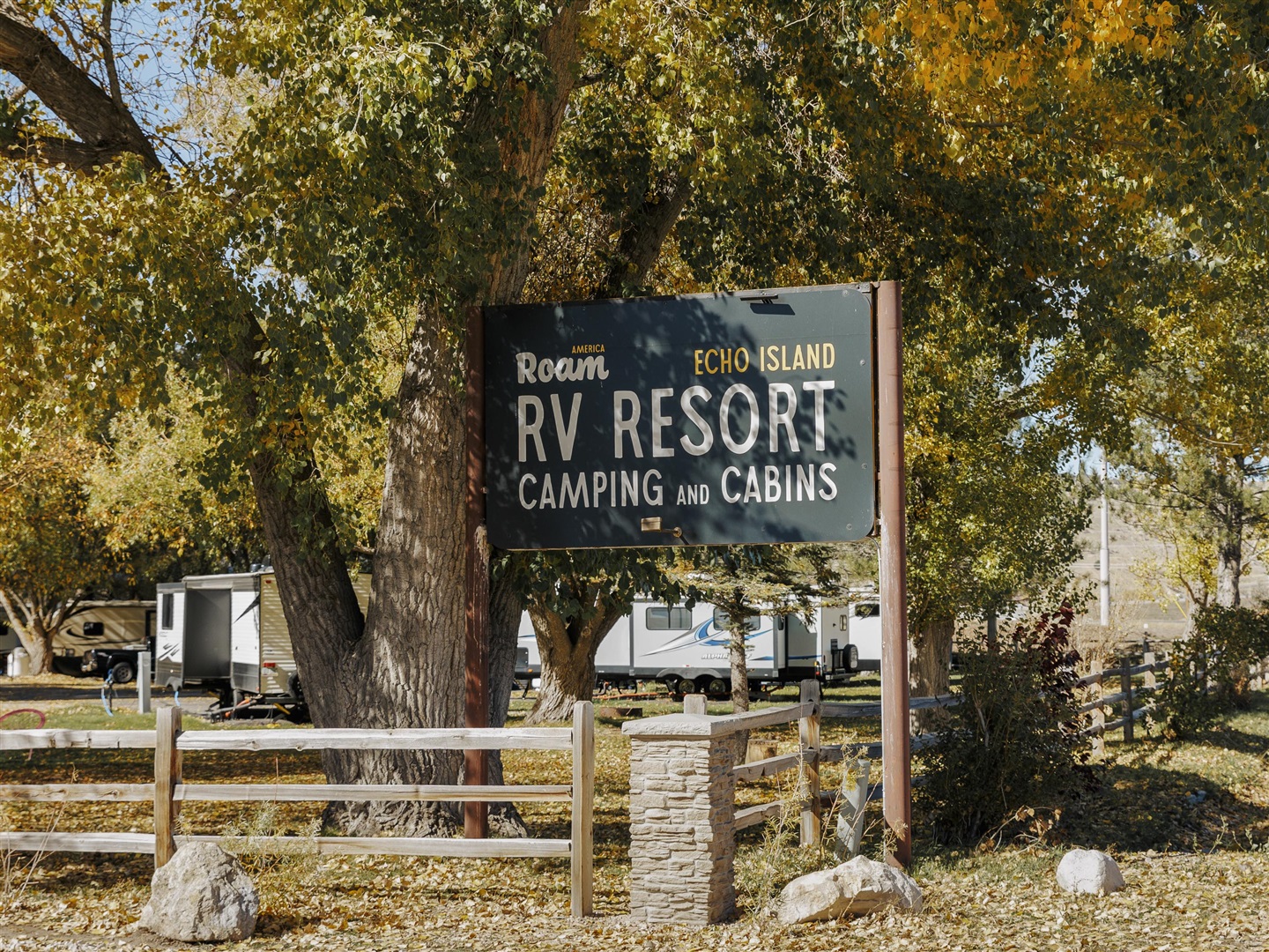 Aerial view of Roam Echo Island RV Resort along the Weber River near Echo Reservoir in Coalville, Utah