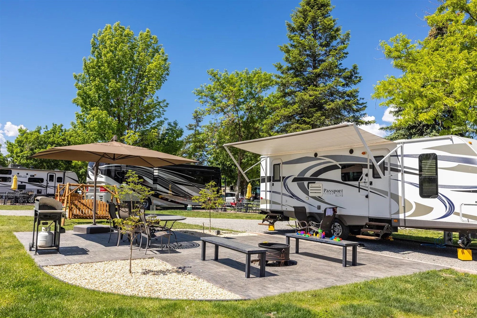 Pull-through RV sites with full hookups at Roam Spokane RV Resort in Spokane Valley, WA
