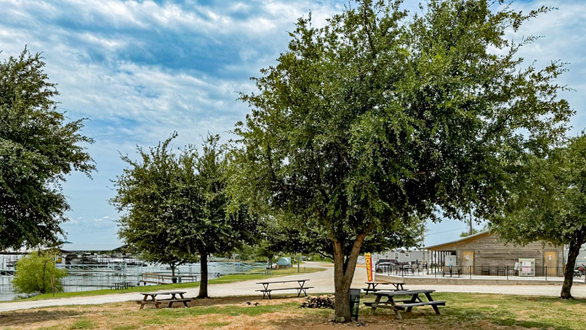 Full hookup RV sites steps from the water at Willow Beach RV Park and Marina in Graford, Texas